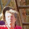 Barbara Jones plastering straw bales