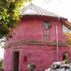 A pink lime wash on the straw bale house