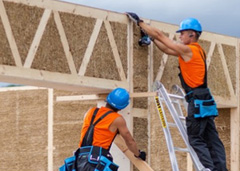 Building with straw panels